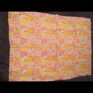 Pink flannel baby quilt / blanket.